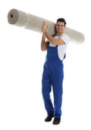 Photo of Male worker with rolled carpet on white background