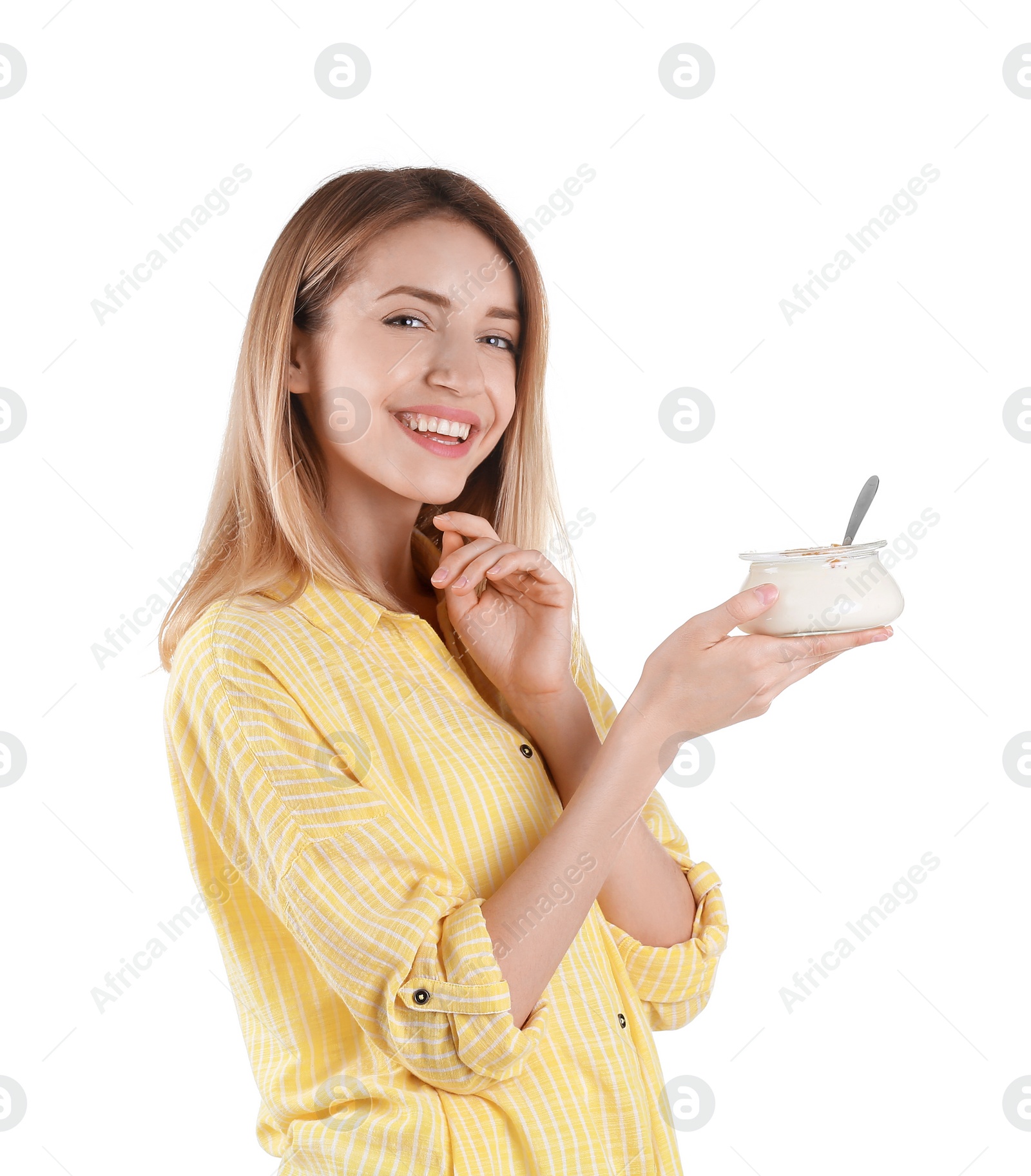 Photo of Young attractive woman eating tasty yogurt on white background