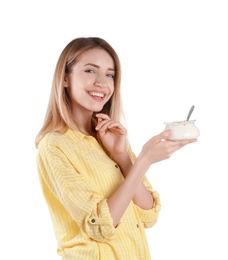 Photo of Young attractive woman eating tasty yogurt on white background