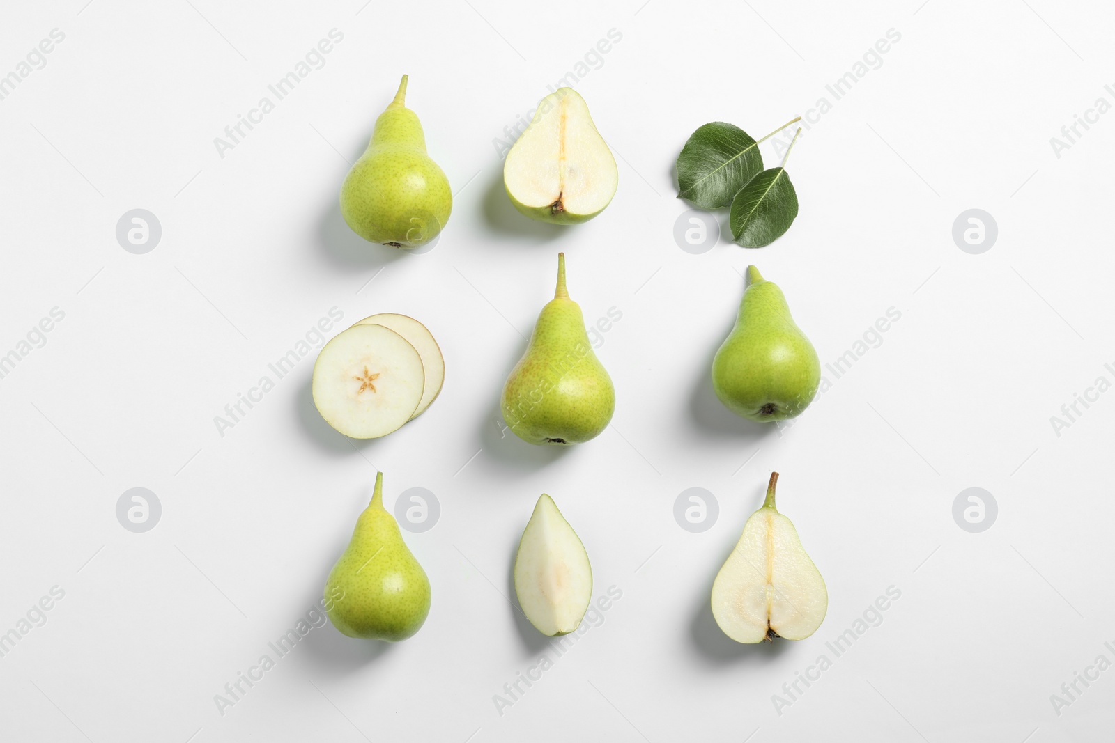 Photo of Ripe juicy pears on white background, top view