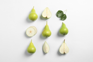 Ripe juicy pears on white background, top view