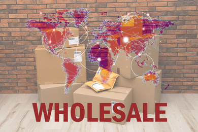 Image of Wholesale business. World map and blurred parcel boxes on background