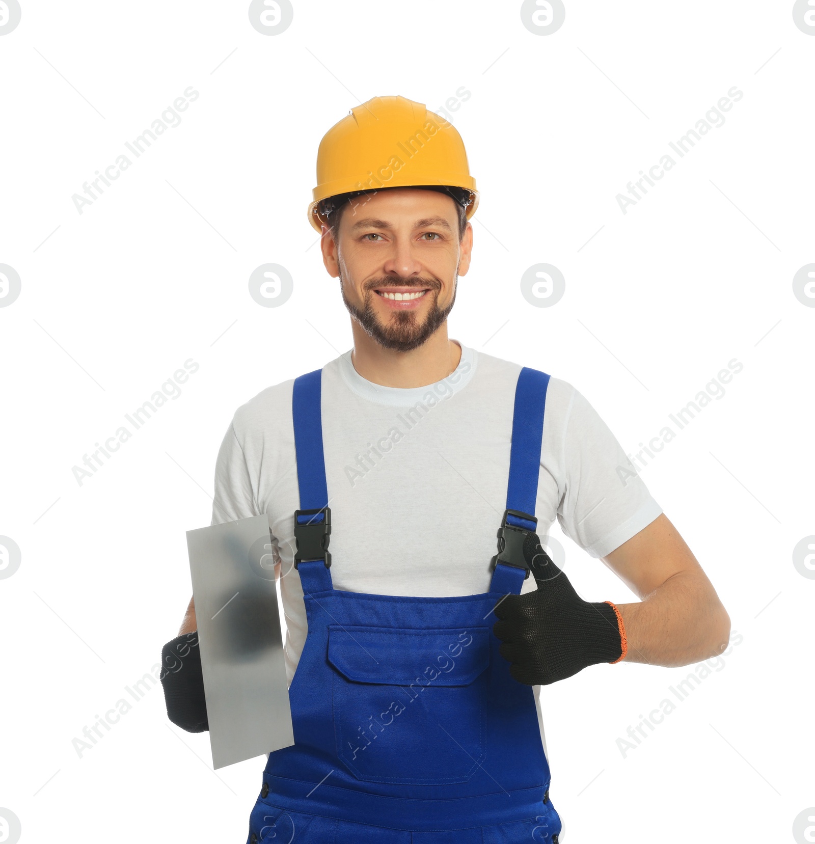 Photo of Professional worker with putty knife in hard hat on white background