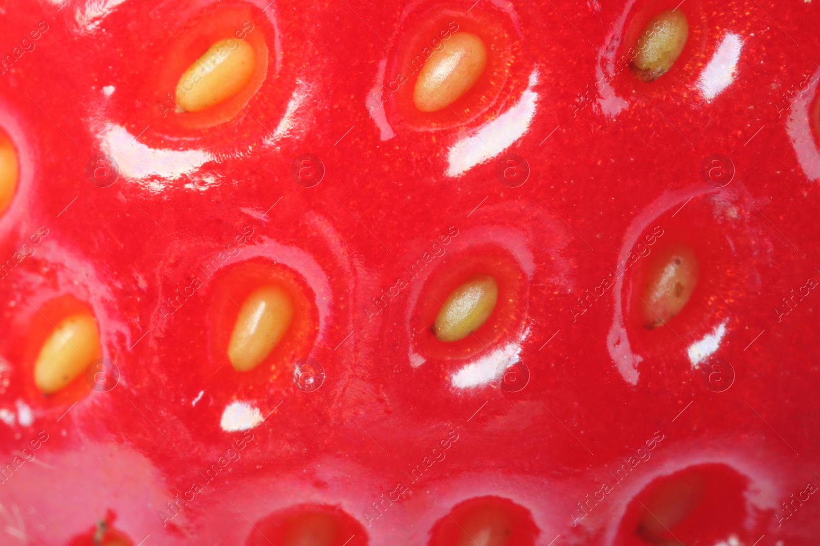 Photo of Texture of ripe strawberry as background, macro view. Fresh berry