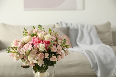 Beautiful bouquet of fresh flowers in vase indoors, space for text