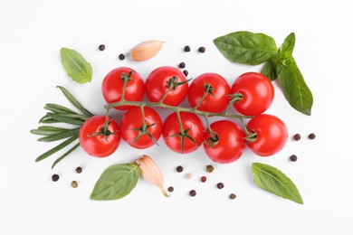 Photo of Flat lay composition with vine of ripe red tomatoes on white background