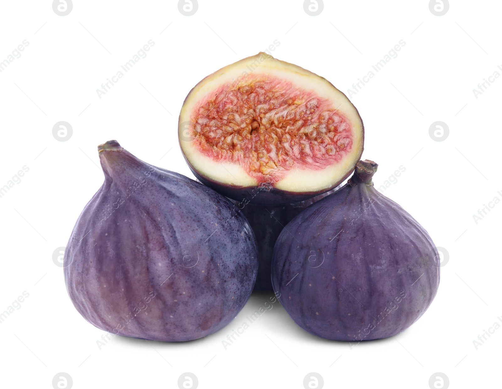 Photo of Whole and cut fresh ripe figs isolated on white