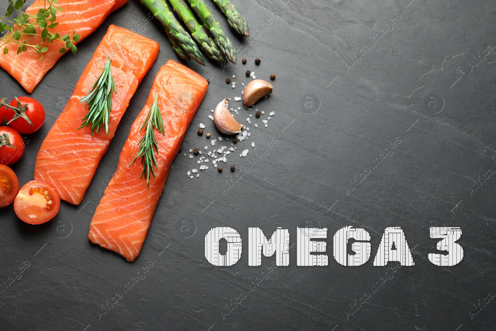 Image of Omega 3. Fresh cut salmon, rosemary and spices on black table, flat lay