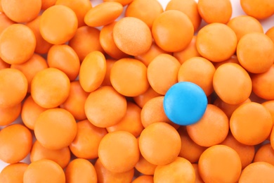 Many colorful candies as background, top view