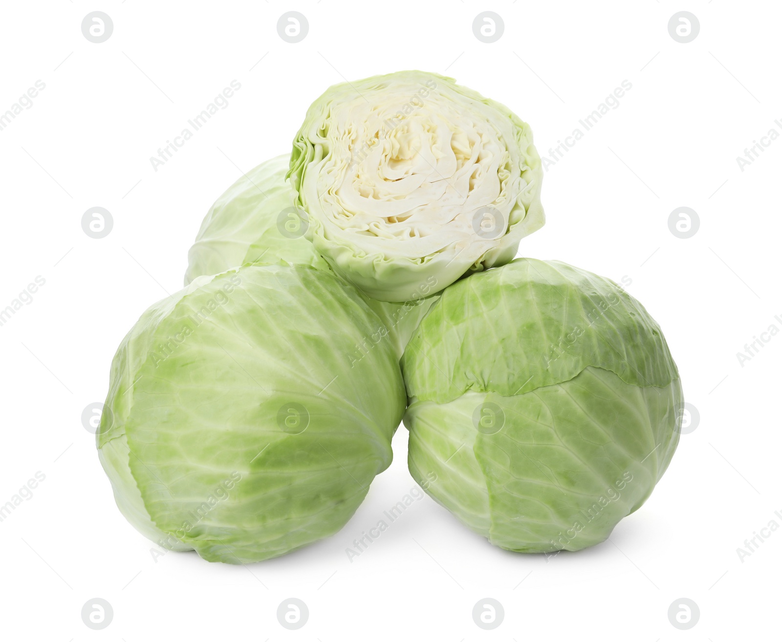 Photo of Whole and cut fresh ripe cabbages on white background