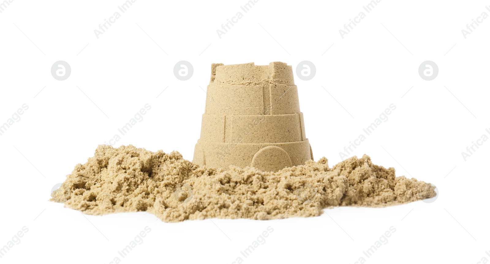 Photo of Pile of sand with beautiful castle isolated on white. Outdoor play