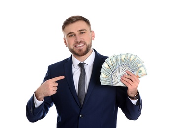 Portrait of young businessman holding money banknotes on white background