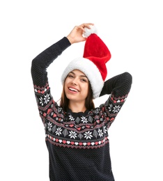 Photo of Young beautiful woman in Santa hat on white background. Christmas celebration