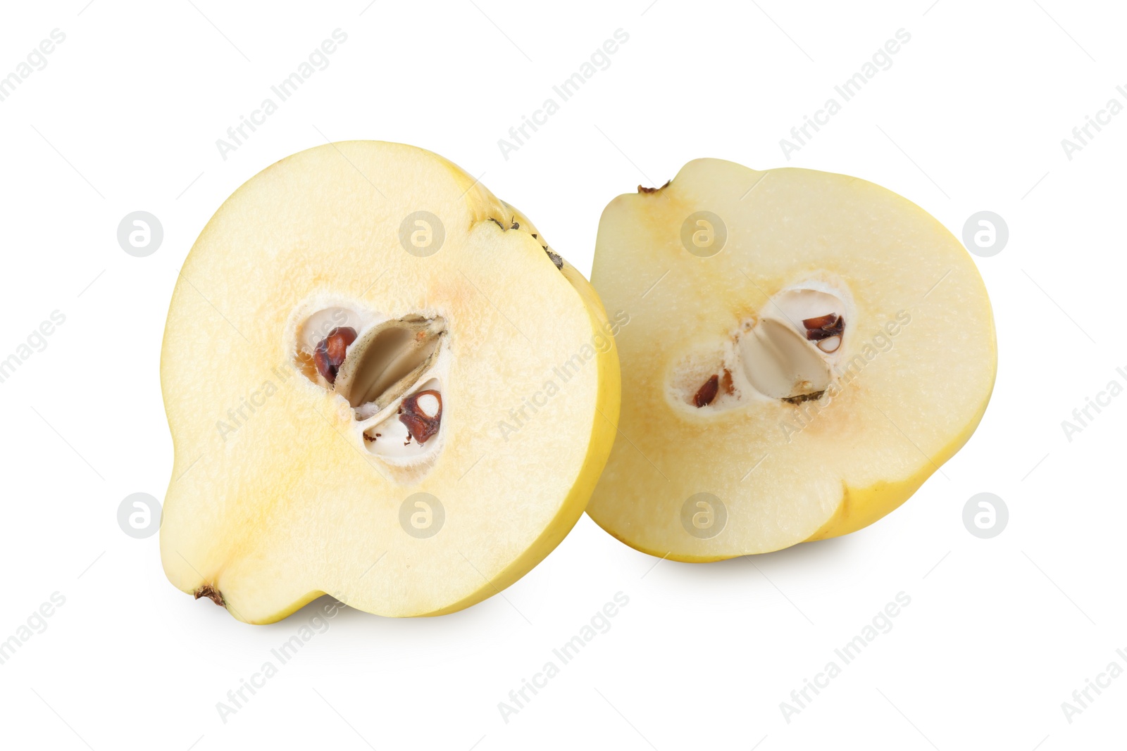 Photo of Halves of fresh ripe quince isolated on white