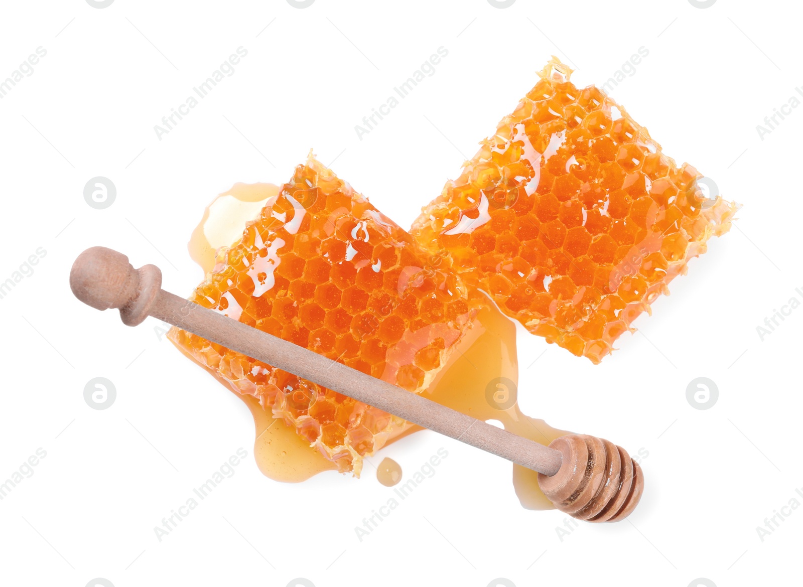 Photo of Natural honeycombs with honey and wooden dipper isolated on white, top view