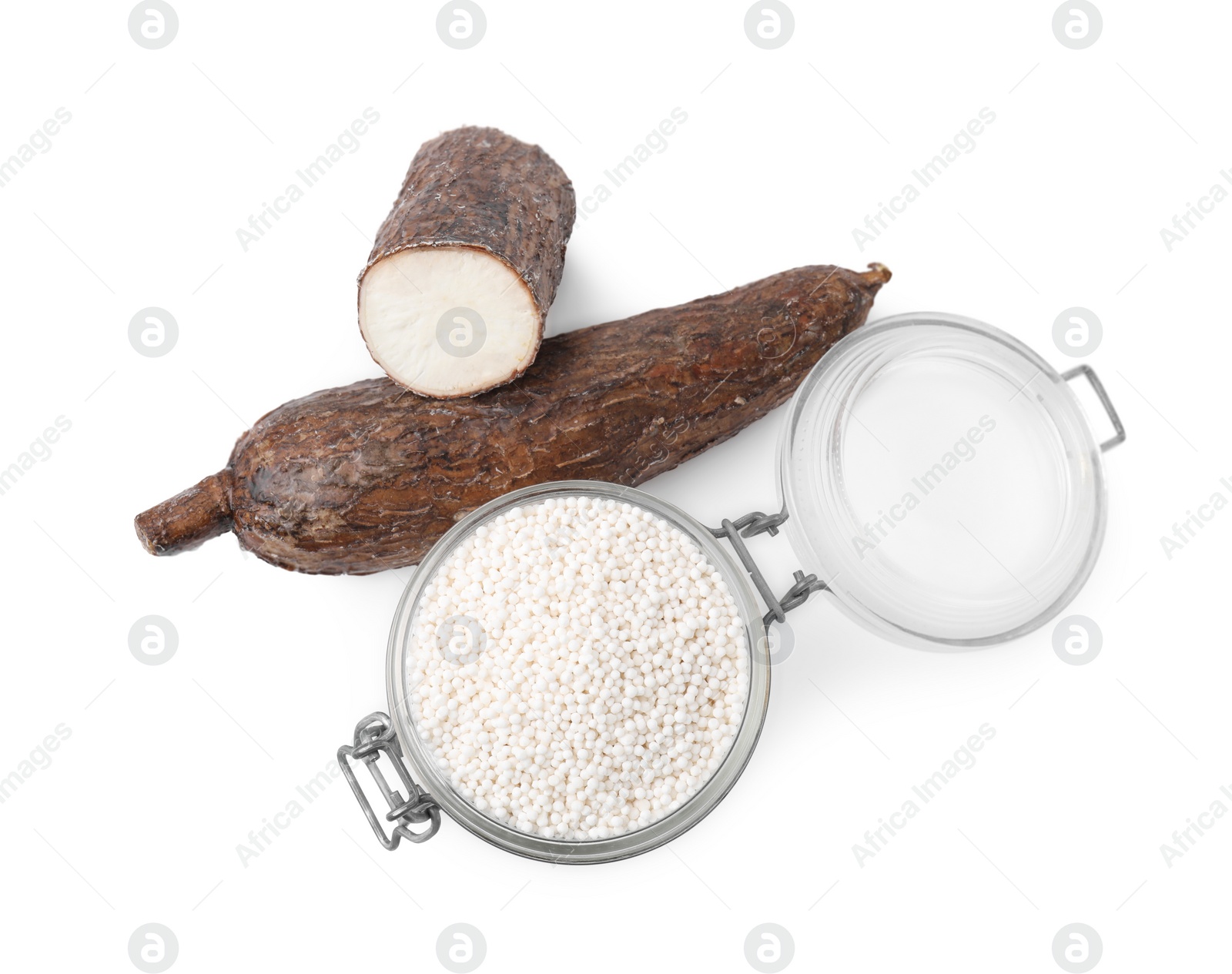 Photo of Tapioca pearls in jar and cassava roots isolated on white, top view