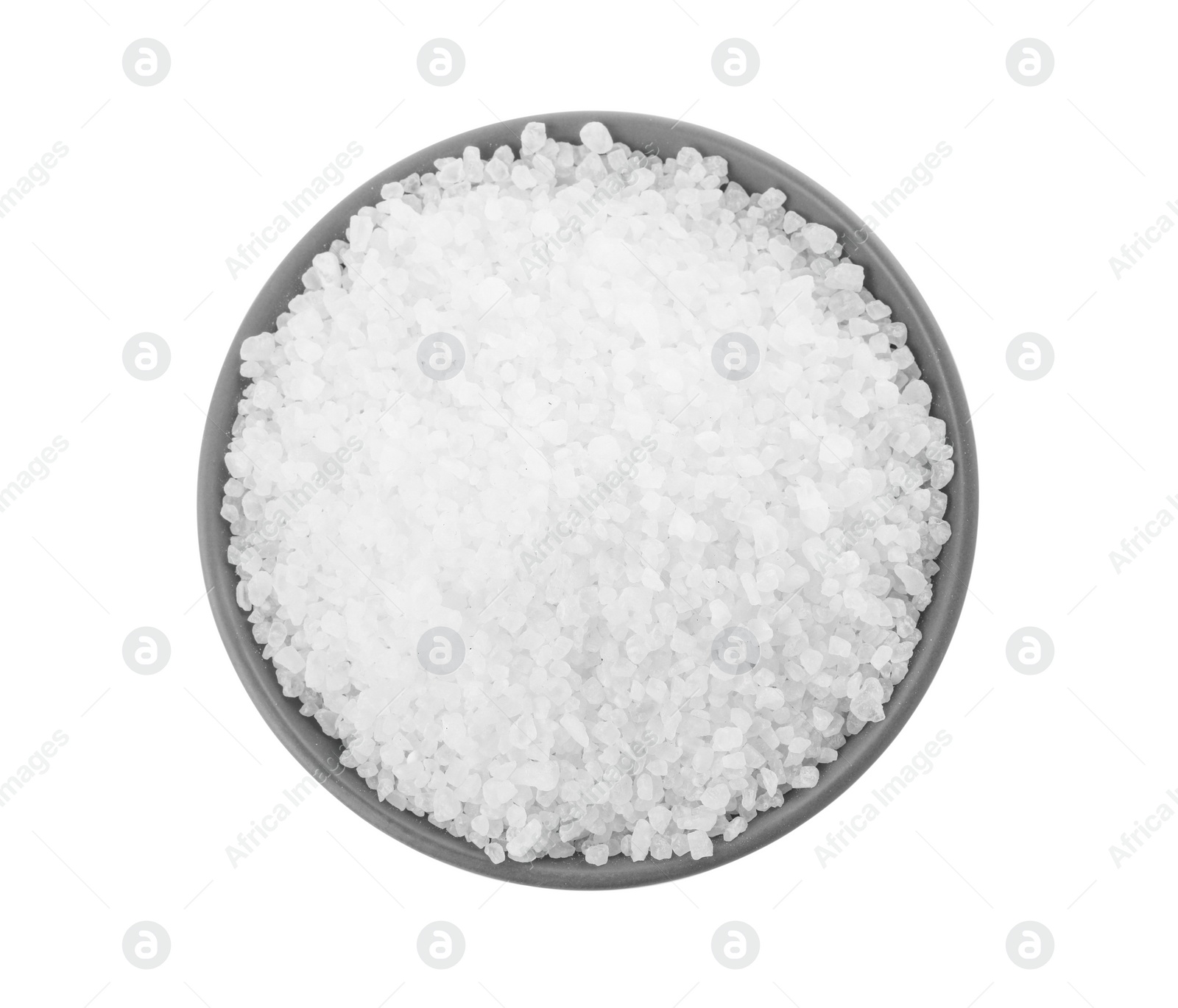 Photo of Natural sea salt in grey bowl isolated on white, top view