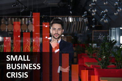 Double exposure of young man in his cafe and falling down financial chart. Small business crisis during covid-19 outbreak