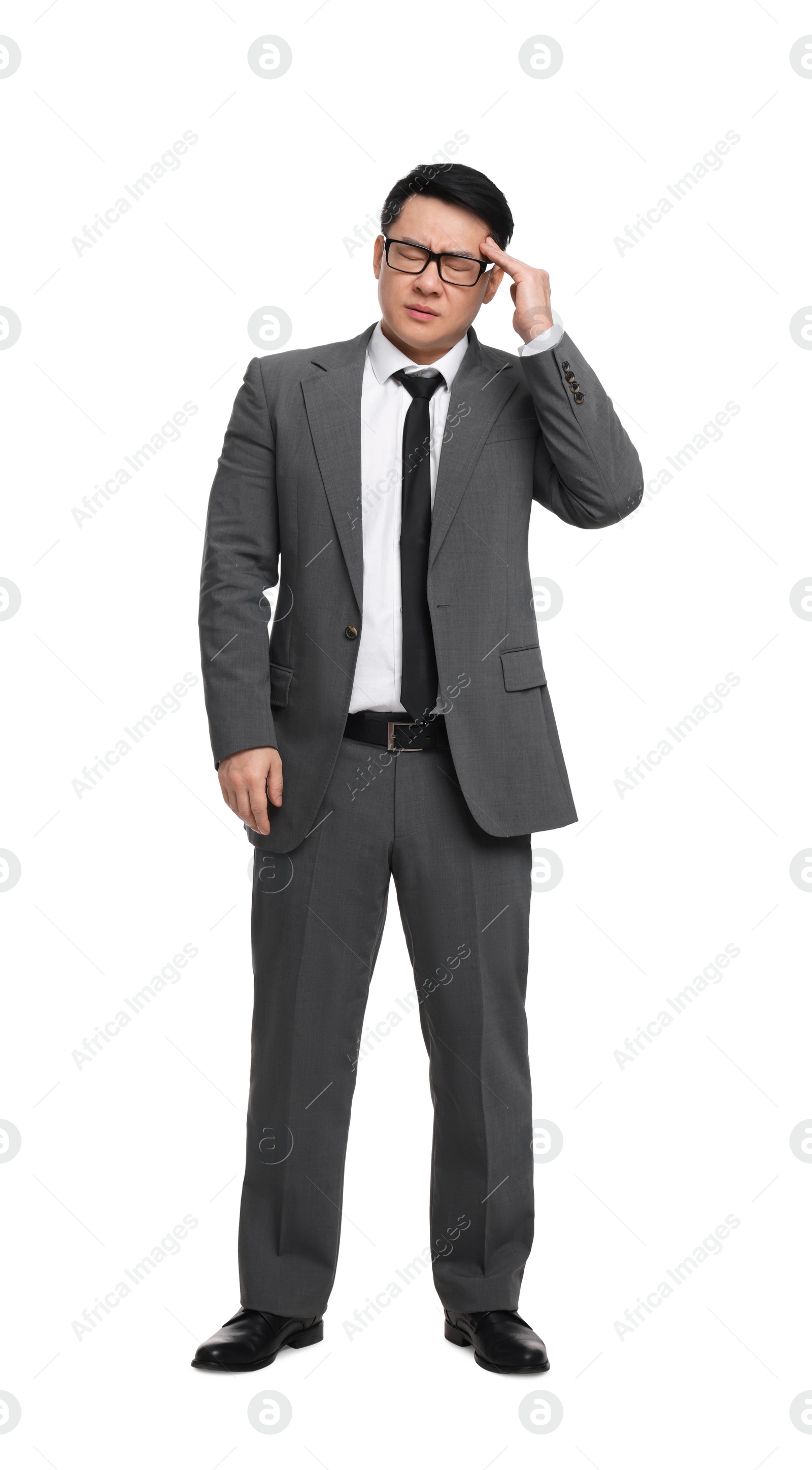 Photo of Tired businessman in suit wearing glasses on white background