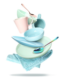 Image of Set of clean tableware and napkin in flight on white background