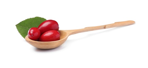 Photo of Fresh ripe dogwood berries in wooden spoon and green leaf on white background