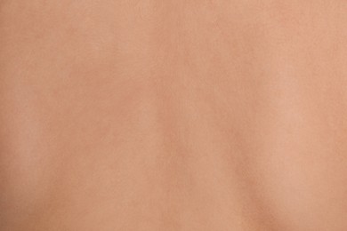 Human skin without birthmarks as background, closeup view