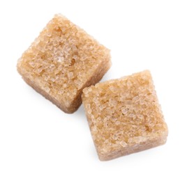 Photo of Two brown sugar cubes isolated on white, top view