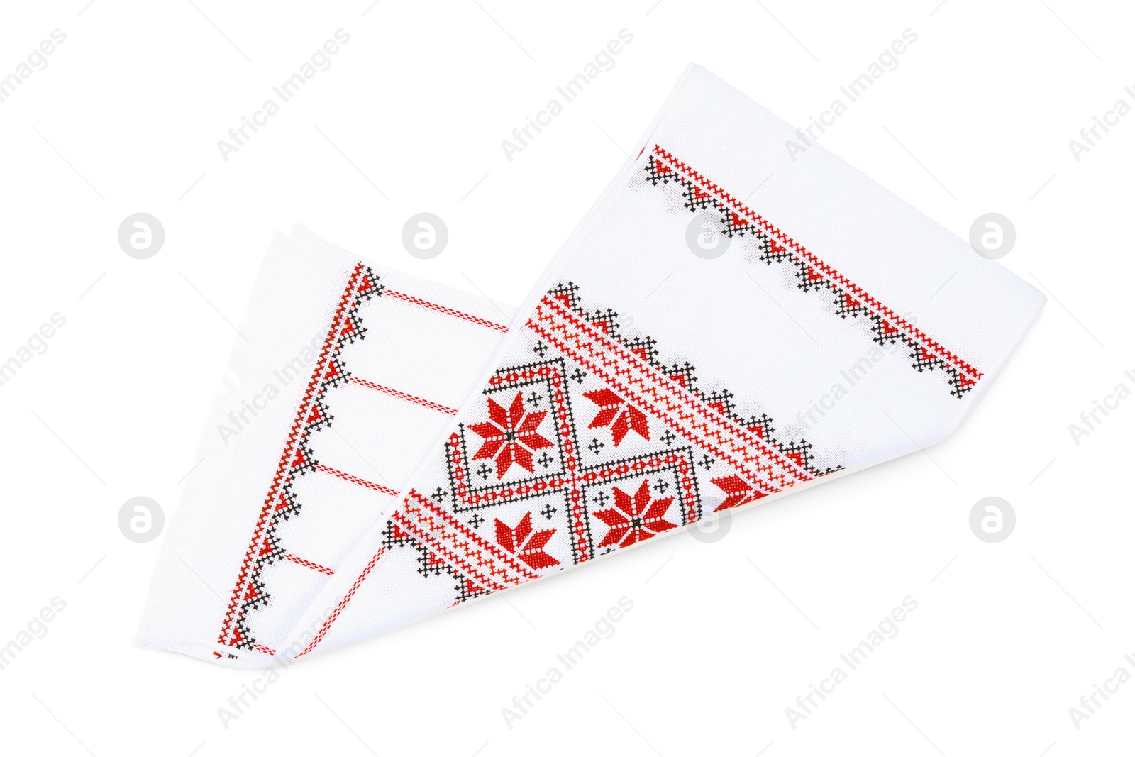 Photo of Beautiful rushnyk on white background, top view. Ukrainian national embroidery