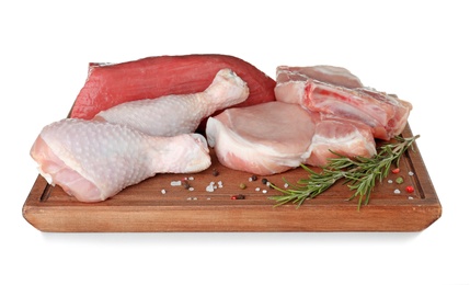 Photo of Wooden board with fresh raw meat, rosemary and spices on white background