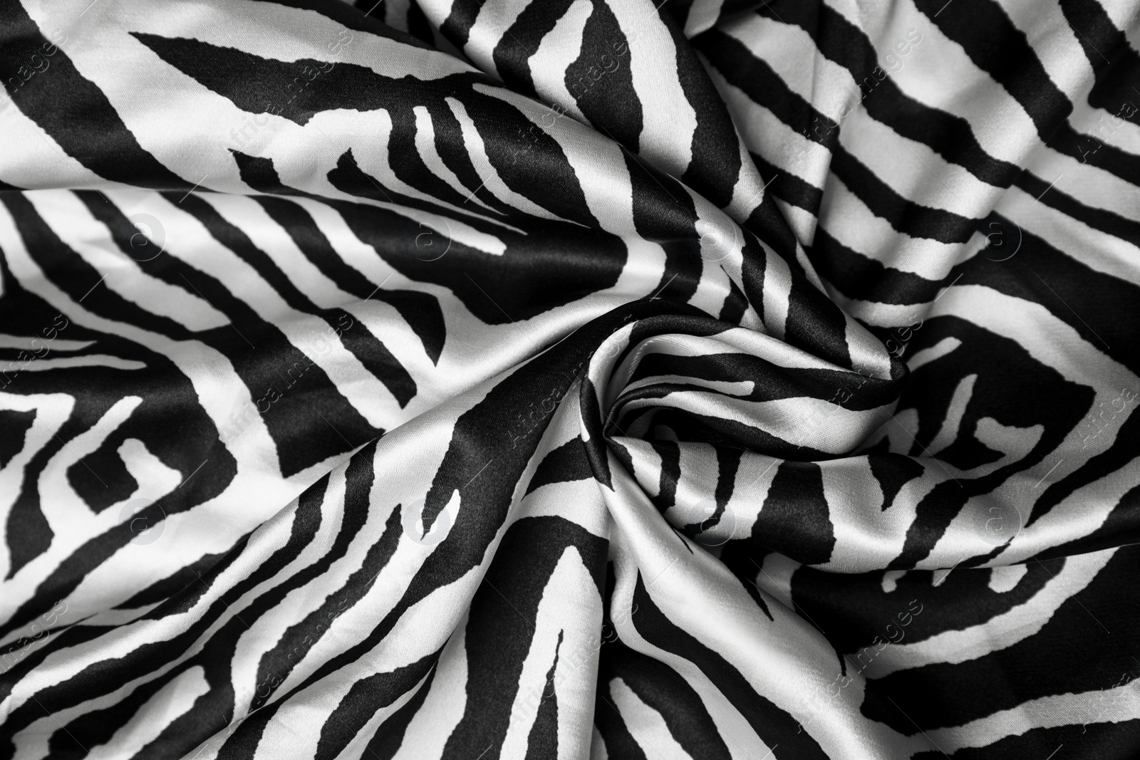 Photo of Texture of beautiful fabric with animal pattern as background, closeup