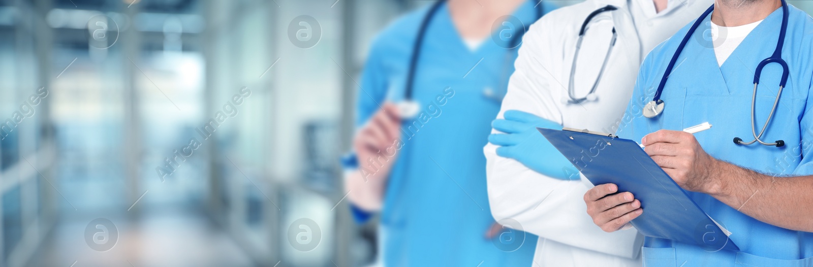 Image of Doctors and nurse in hospital, closeup. Banner design with space for text