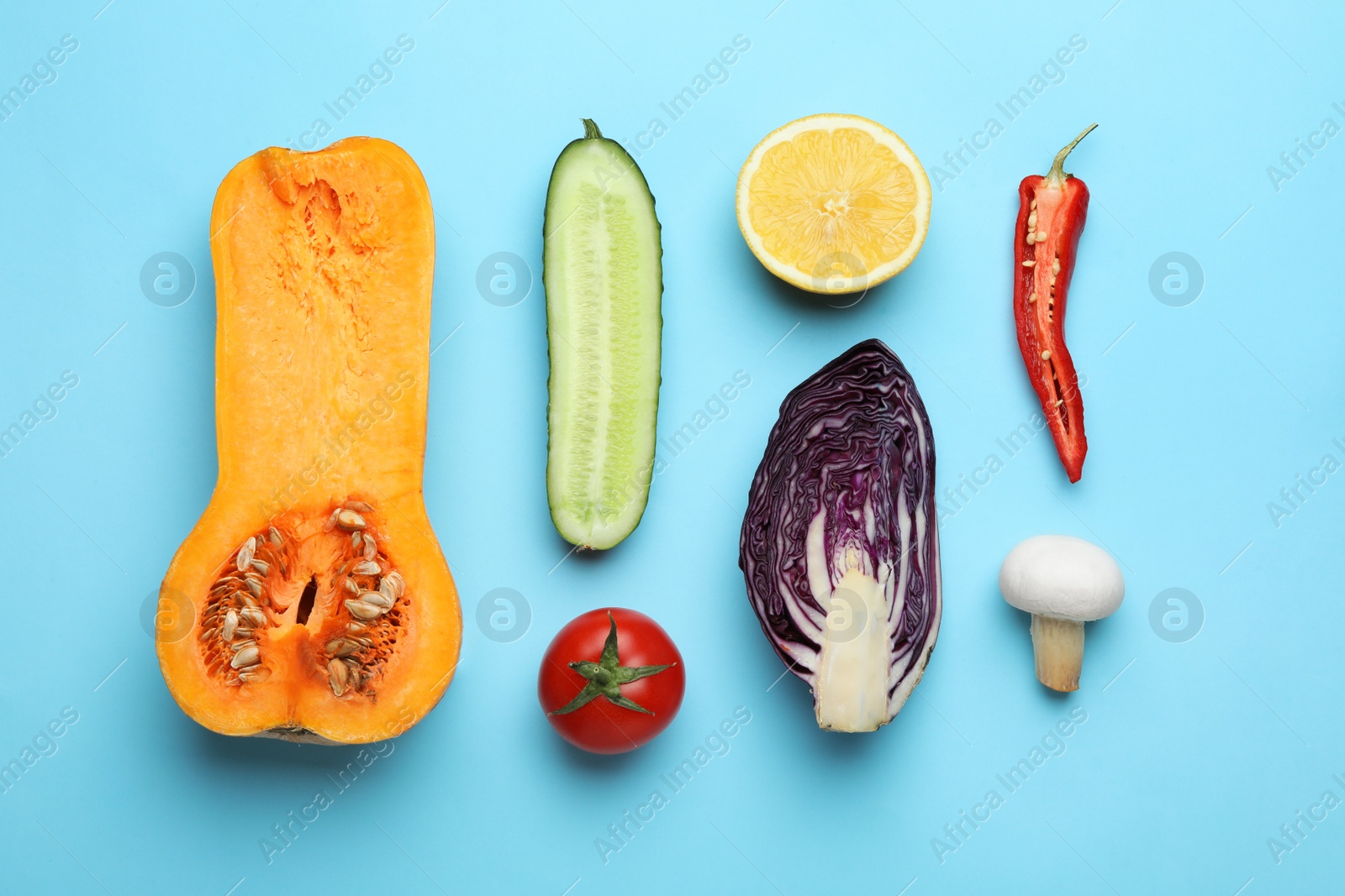 Photo of Flat lay composition with fresh ripe vegetables on color background