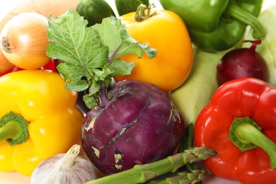 Many fresh ripe vegetables as background. Organic food