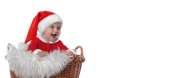 Cute baby in wicker basket on white background, banner design. Christmas celebration