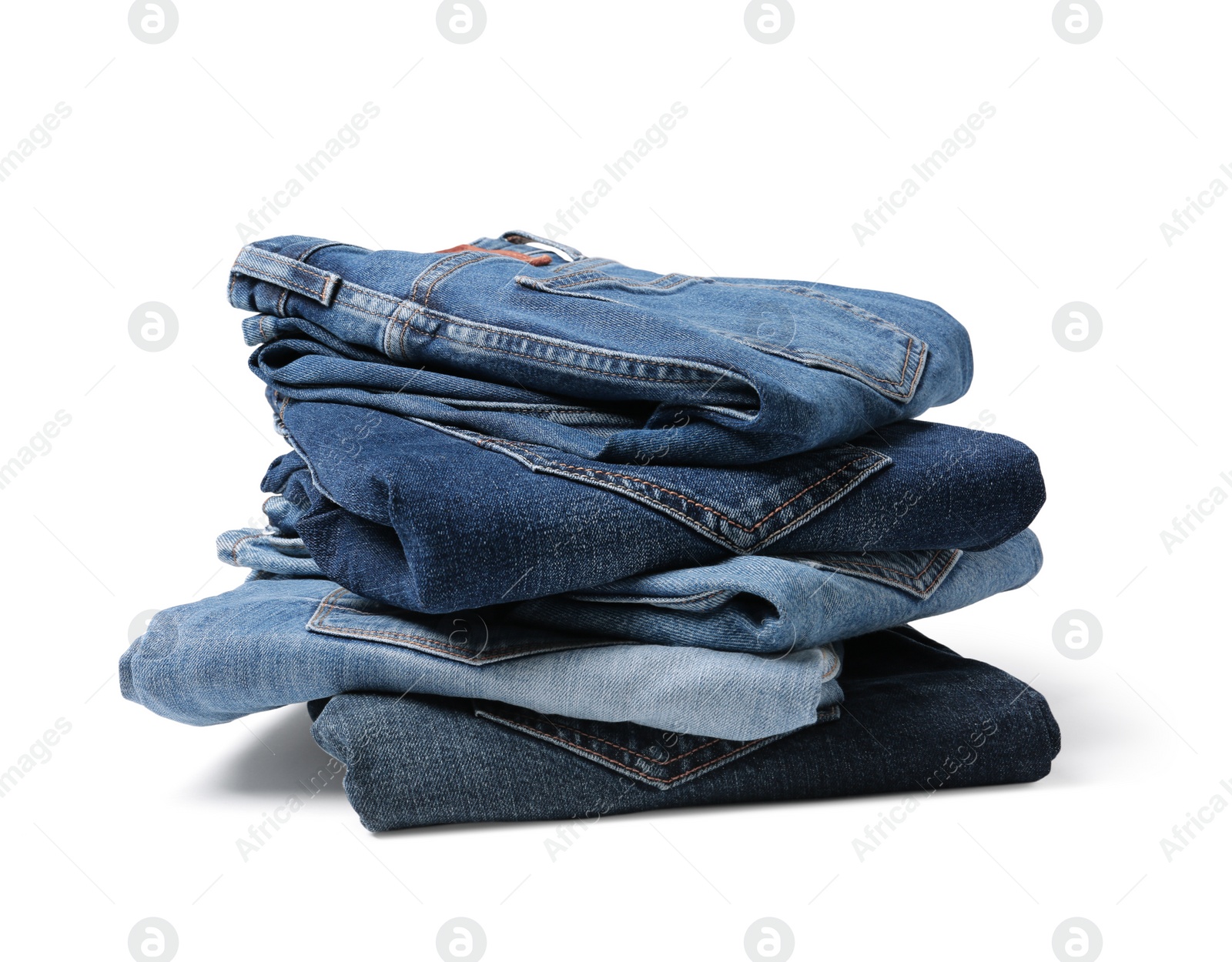 Image of Stack of different folded jeans isolated on white