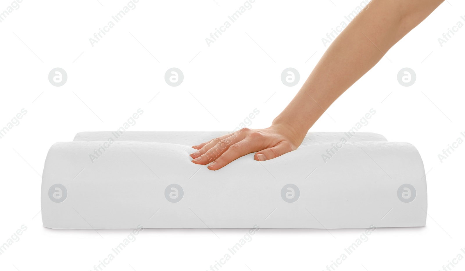 Photo of Woman touching orthopedic memory foam pillow on white background, closeup
