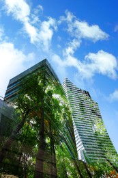 Image of Double exposure of green trees and buildings in city