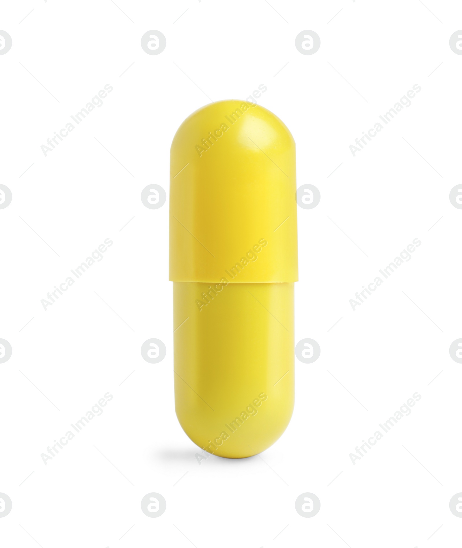 Photo of One yellow pill isolated on white. Medicinal treatment