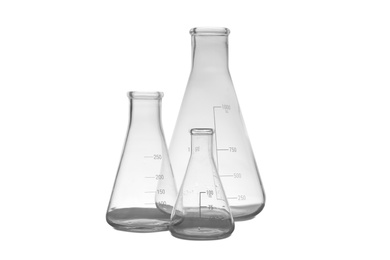 Photo of Empty conical flasks on white background. Laboratory glassware