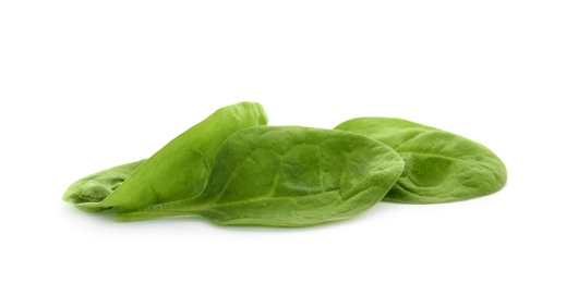 Fresh leaves of spinach isolated on white