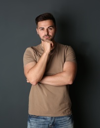 Photo of Portrait of handsome man on dark background