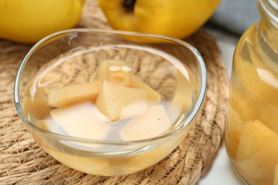 Photo of Delicious quince drink and fresh fruits on table, closeup