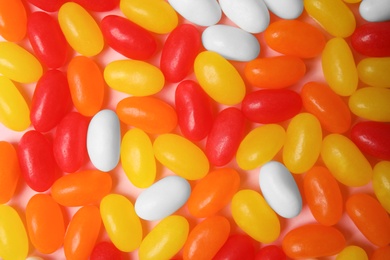Photo of Delicious jelly beans of different colors, closeup