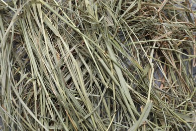 Heap of dried hay as background, top view