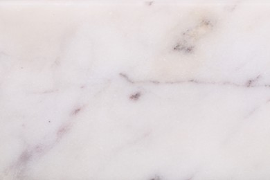 Photo of Texture of marble surface as background, closeup