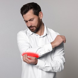 Image of Man suffering from rheumatism on light background