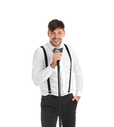 Photo of Handsome man in formal clothes posing with microphone on white background