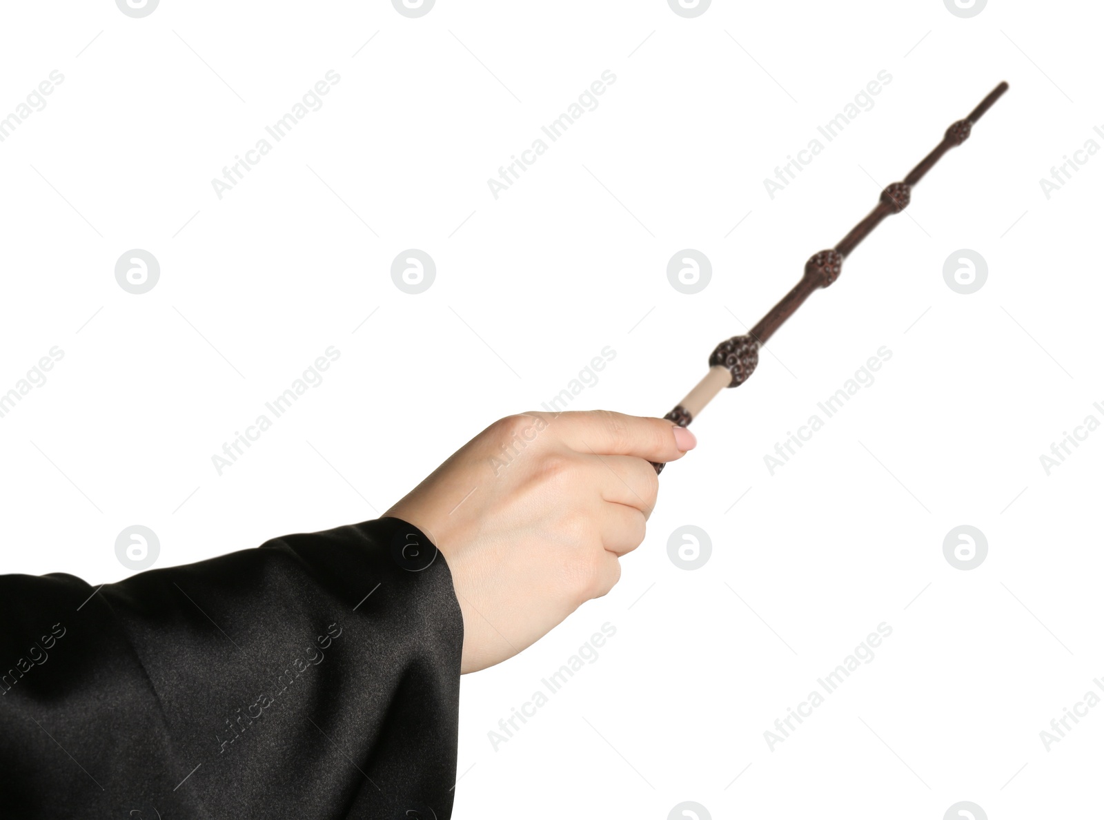 Photo of Wizard holding magic wand on white background, closeup