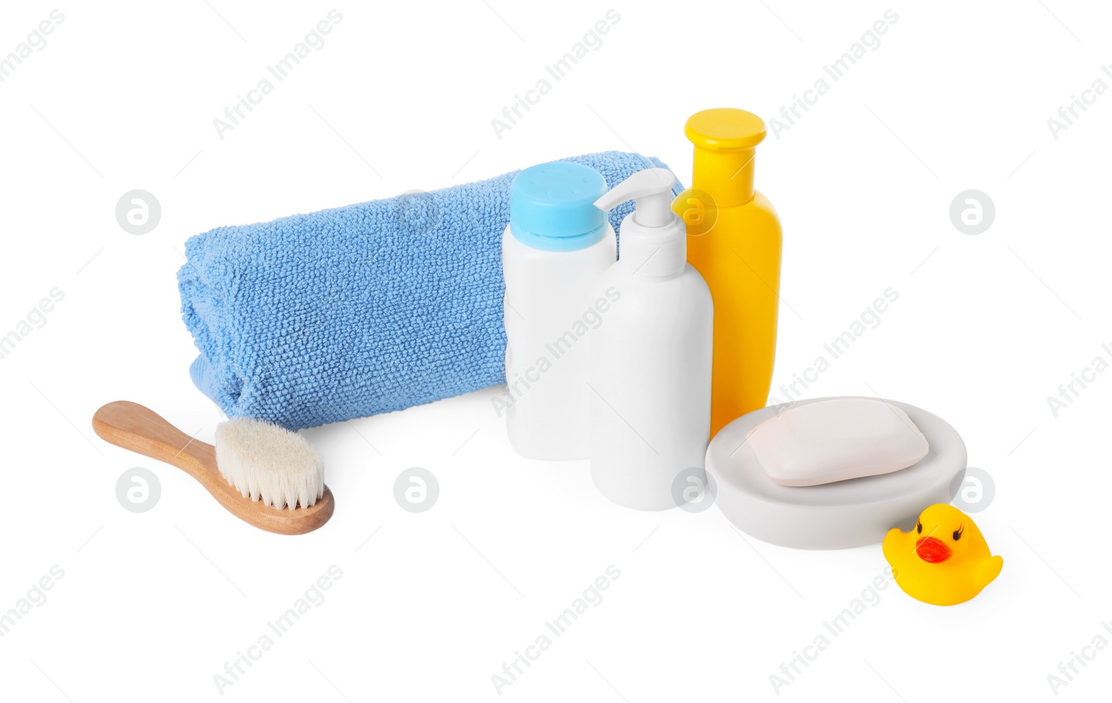 Photo of Baby cosmetic products, bath duck, brush and towel isolated on white