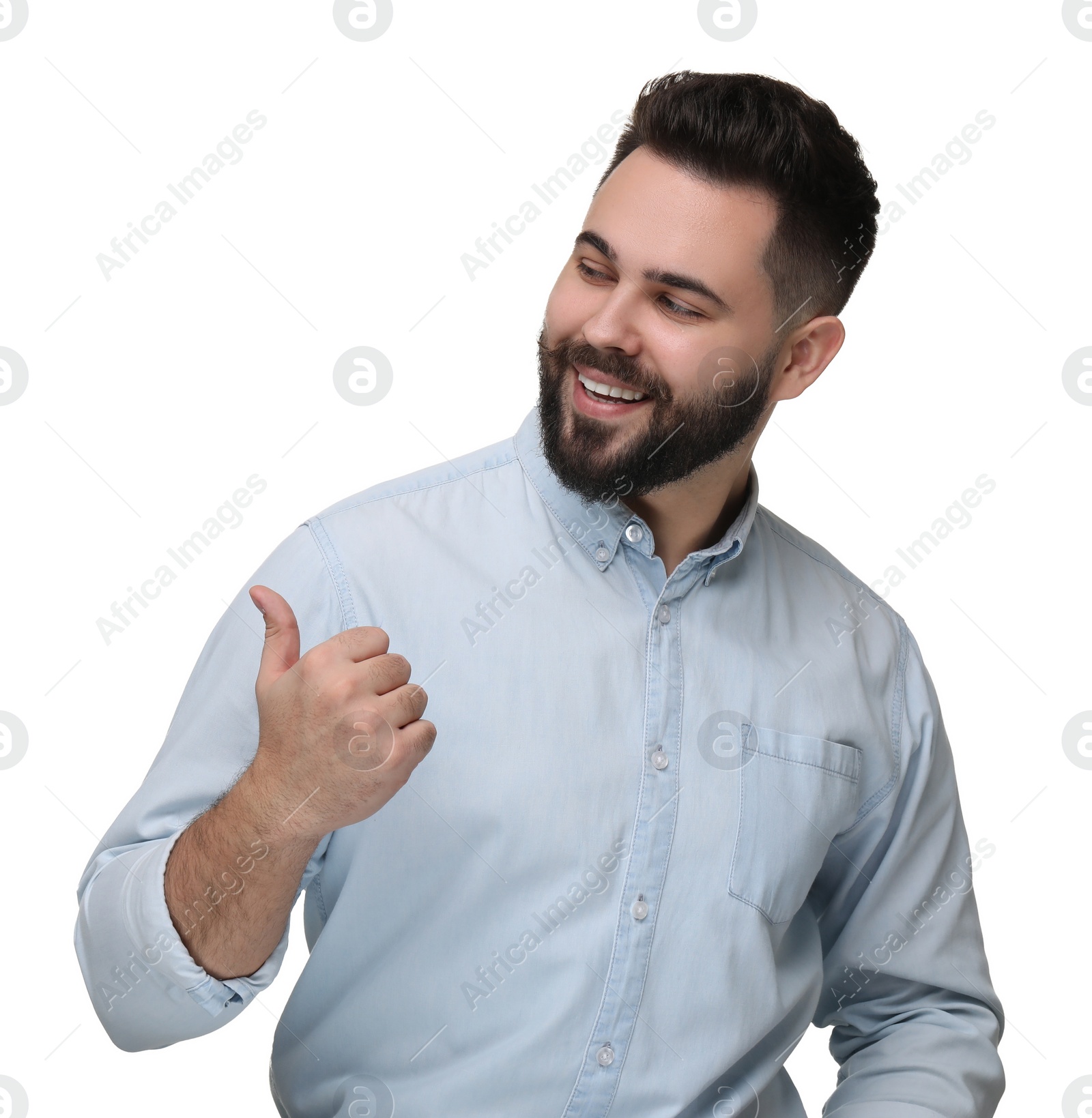 Photo of Happy young man with mustache pointing at something on white background